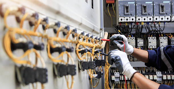 Professional Electrician technician working in Lee's Summit, MO